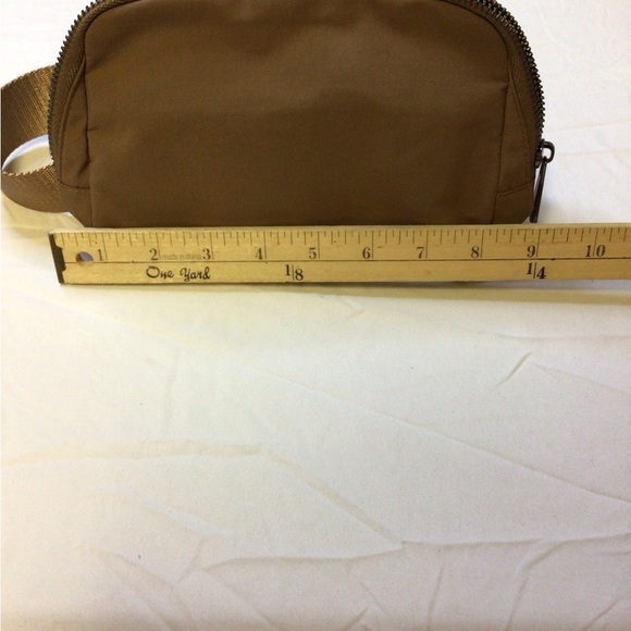 Tan Crossbody Bag with Adjustable Strap and Durable Fabric - Picture 7 of 9